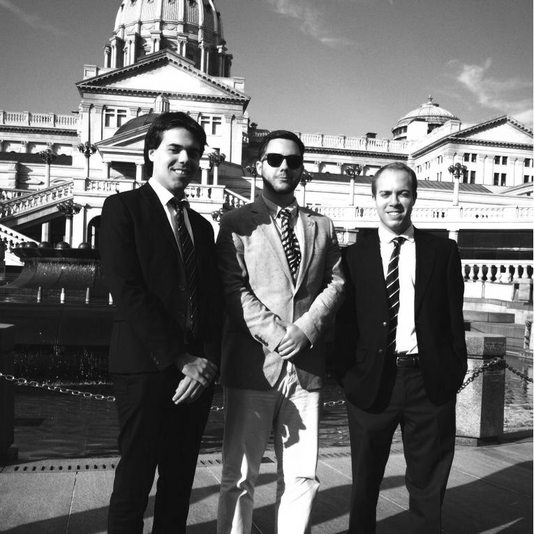 Ryan Stevens, center, posing at the Harrisburg State Capitol. Photo Courtesy of Ryan Stevens