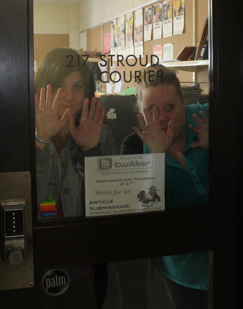 Editor-in-Chief Valentina Caval and Managing Editor Victoria Krukenkamp block the entrance to The Stroud Courier office. Photo Credit / The Stroud Courier