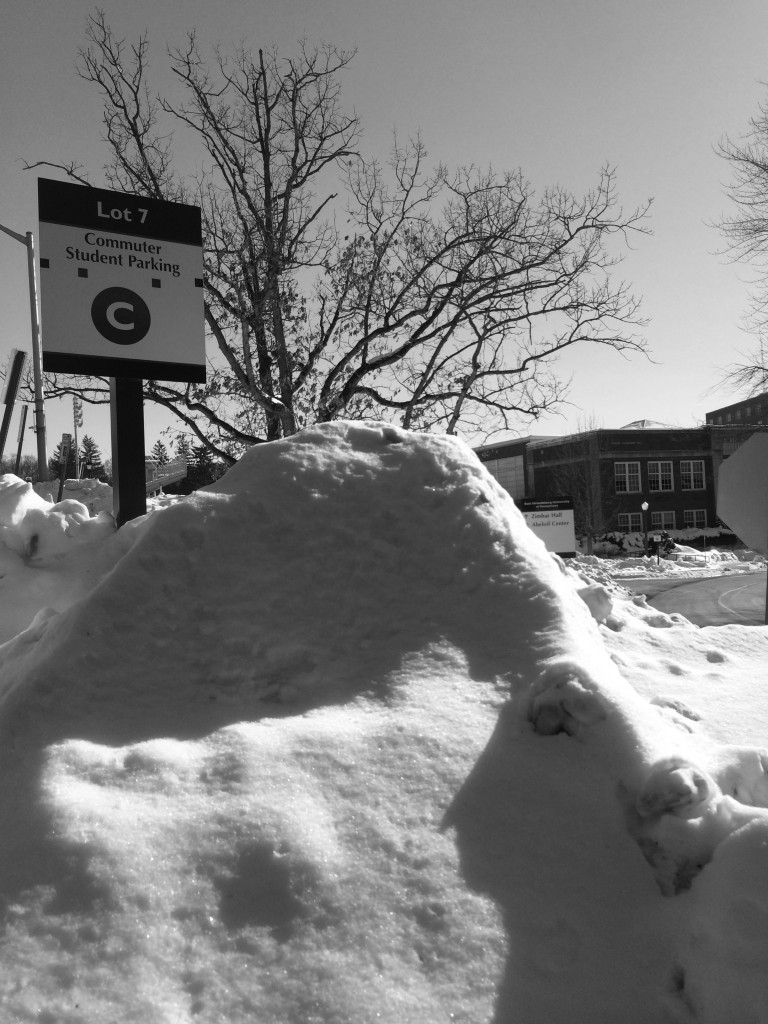 Snow piles at ESU are just one sign of how treacherous the roads can be. Photo Credit / Audra Organetti