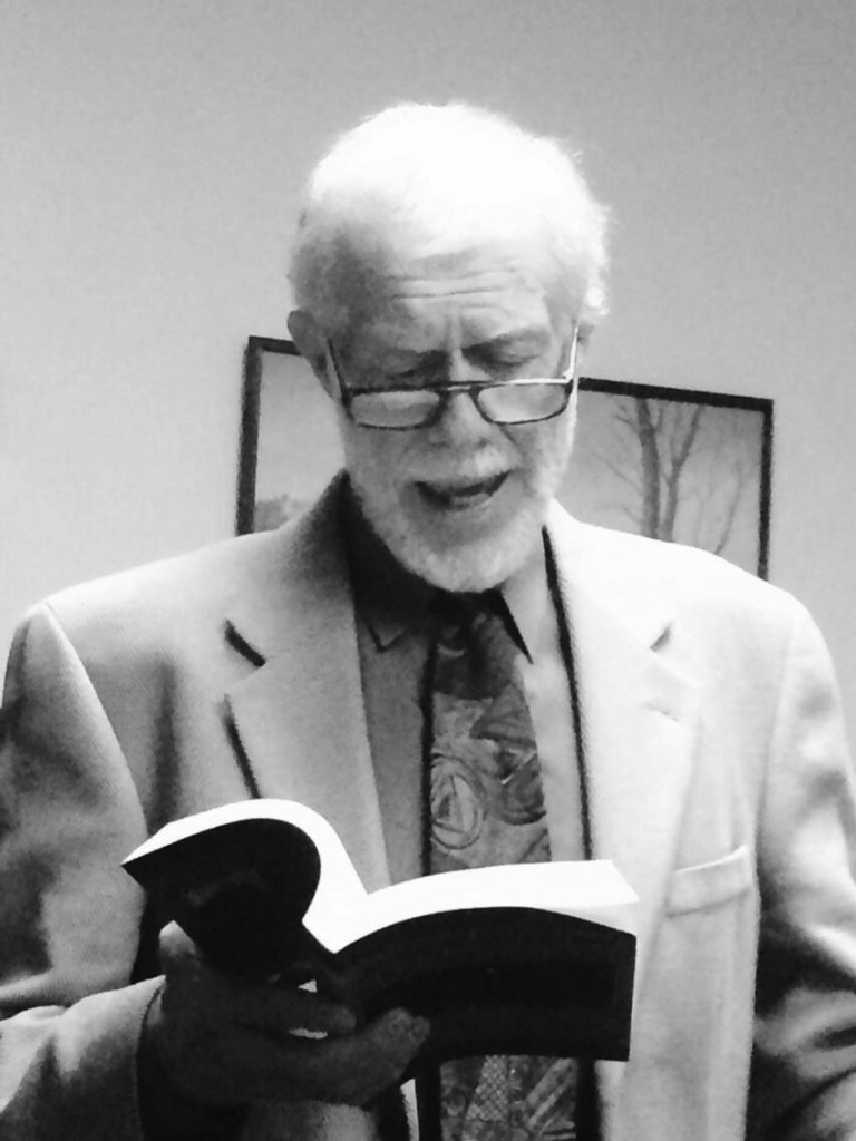 Dr. Fred Misurella reads from “Arrangement in Black and White.” Photo Credit / Dr. Nancy VanArsdale