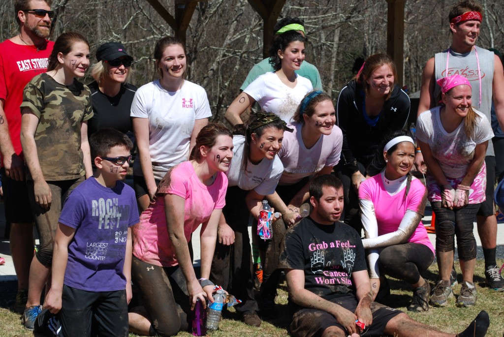 Those involved in the Diamonds in the Dirt Mudrun pose for a group photo after the run. Photo Credit / Ronald Hanaki