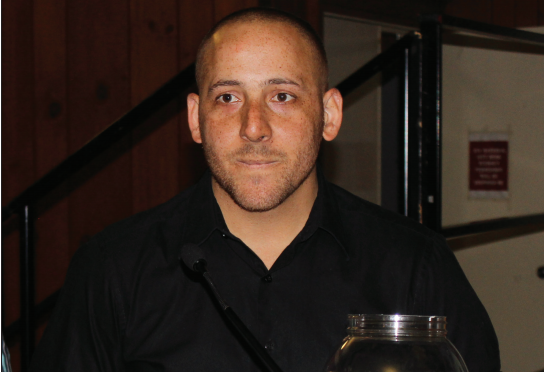 Kevin Hines raffled off copies of his book and bags of Snickers after his speech. Photo Credit / Jamie Reese