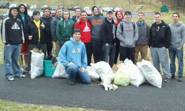 The Delta Chi brothers helping the ESU community clean up! Photo Credit / Phuong Le