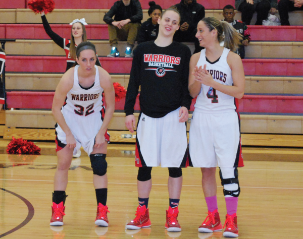 ESU's starting lineup is introduced to the court. Photo Credit / Ronald Hanaki