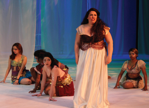 Titania (Rebecca L. Regina), queen of the fairies, stands before her fairy subjects. Photo Credit / Jamie Reese