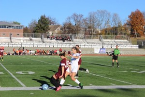 Super Sammi Jo Hughes and Gannon's Lindsey Green battle it out on the field.