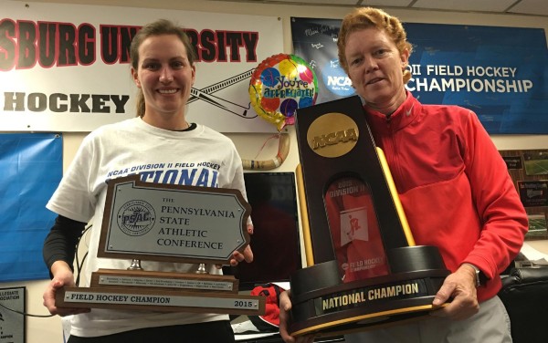 Coach Katie Ord and head coach Sandy Miller show off their championship trophies. Photo Credit / Ronald Hanaki
