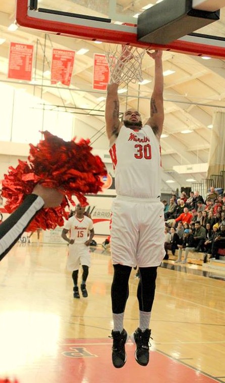 Rasheed Moore dunks. Photo Credit / Mitch Williams