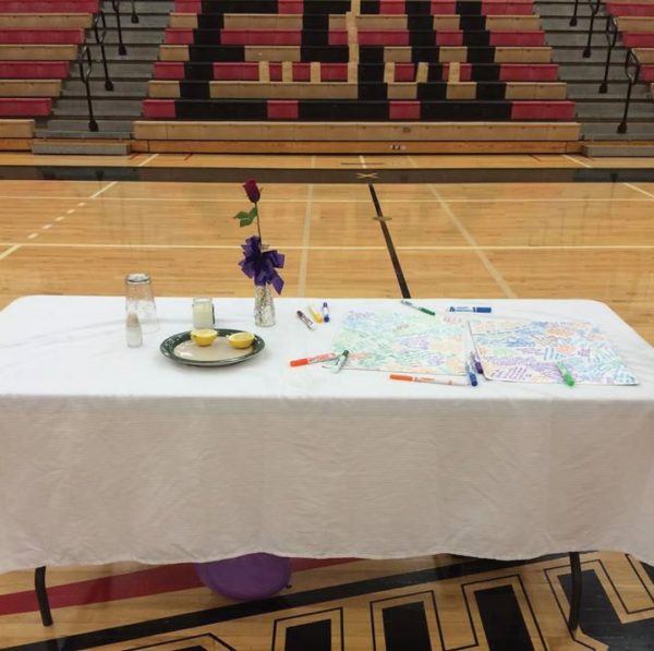 Last year’s Empty Table Ceremony imparts a symbolic sentiment. Photo Courtesy / Gabrielle Marcanton