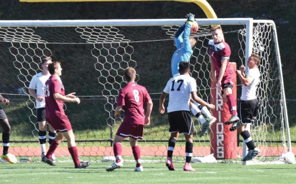 Goalkeeper #0 Will Boerema elevates to make an outstanding save against Lock Haven. Photo Credit / Ronald Hanaki