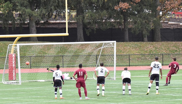 UDC freshman midfielder #3 Gabriel Torres scores on a penalty kick. Photo Credit / Ronald Hanaki