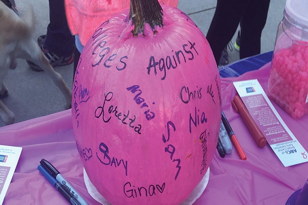 A pumpkin is designed by Colleges Against Cancer. Photo Credit / Nia Scott