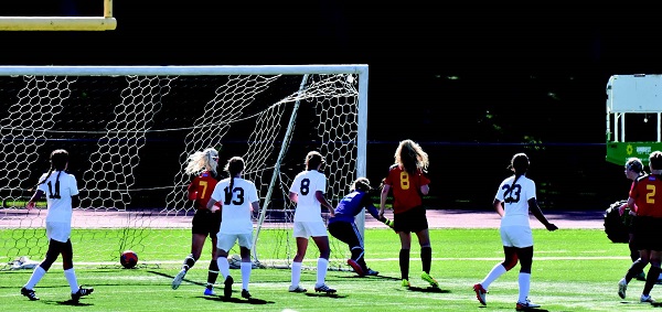 Freshman midfielder Danielle Cary scores the first goal off of a corner kick for ESU. Photo Credit / Ronald Hanaki