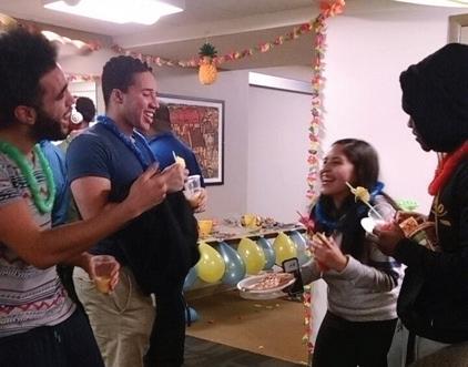 Students mix and mingle at the “Tropical Paradise" Social. Photo Credit / Laura Jean Null