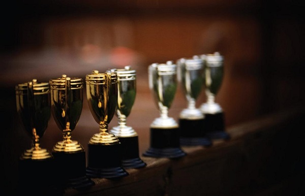 A row of standing trophies. Photo Courtesy / Flickr