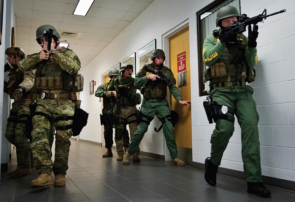 Photo Courtesy / Wikimedia Commons Frightening active shooters attend a college dorm room.