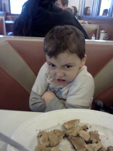 Angry child at dinner. Photo Credit / Wendy Riga
