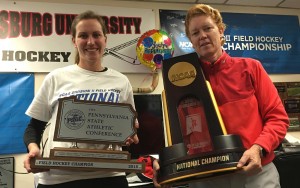 Coach Katie Ord and head coach Sandy Miller show off their championship trophies. Photo Credit / Ronald Hanaki