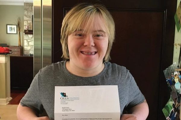 Rachel Grace proudly poses with her ESU CILLS acceptance letter. Photo Courtesy / ESU PR