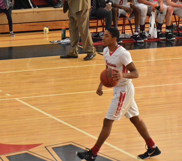 Sophomore point guard #11 Kitt Najee Walls had 13 points and 7 assists in the opening round. Photo Credit / Ronald Hanaki