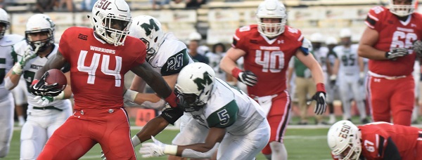 Redshirt-junior tailback #44 Jaymar Anderson (left in red) rushed 22 times for 131 yards. Photo Credit / Ronald Hanaki