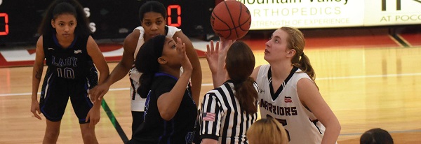Photo Credit / Ronald Hanaki Freshman center #25 Marlene Bassett (on the right) is ready to contest the opening tip.