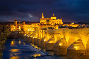 Roman Bridge over Guadalquivir River. In the background, Mosque-Cathedral. Cordoba, Andalucia. Andalusia. Spain.