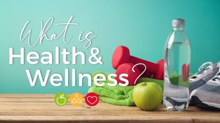 Excersize equipment and healthy food on a table with text, "What is health and wellness?"