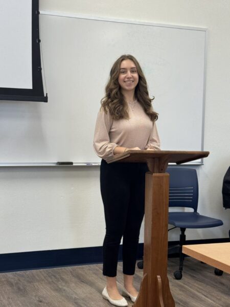 Photo of Ana Laska at the podium